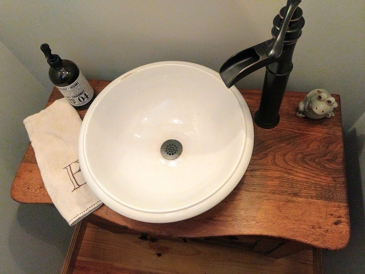 Vessel sink and faucet on display